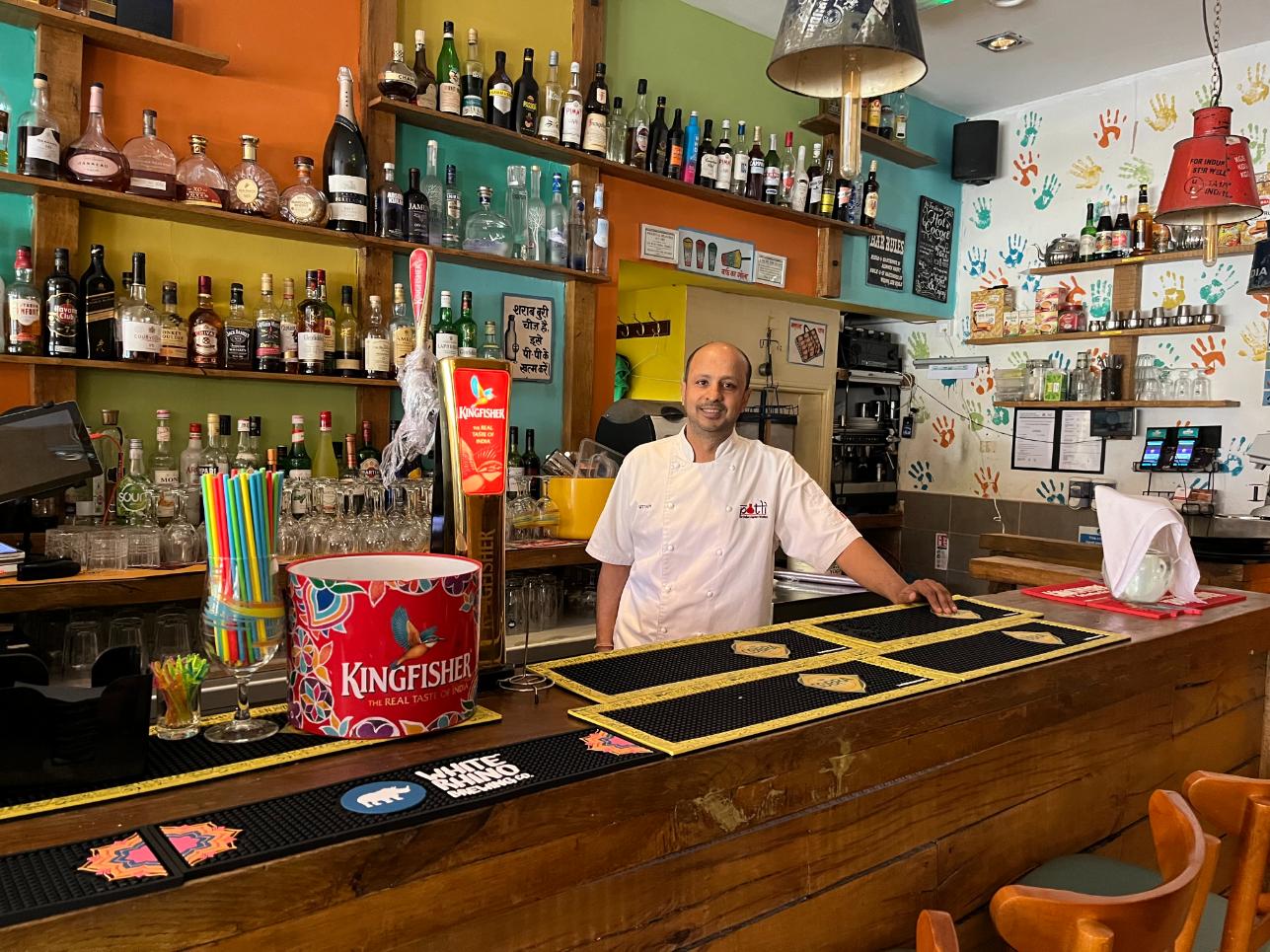 A Potli chef behind the bar in the restaurant